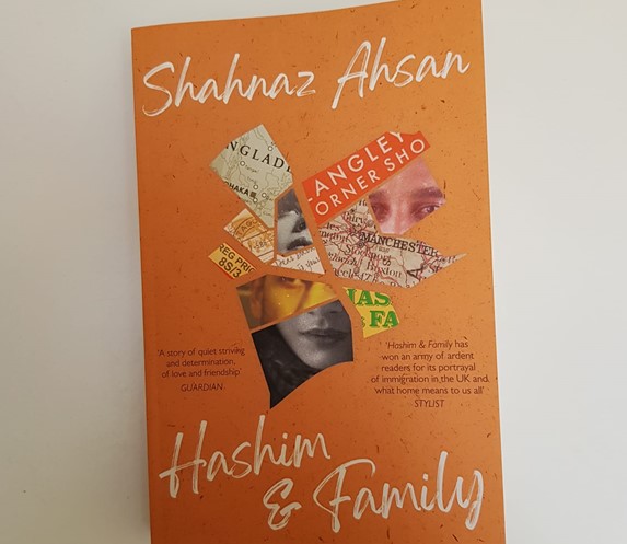 Cover of Hashim & Family orange background with collage of images arranged in the shape of the map of Bangladesh
