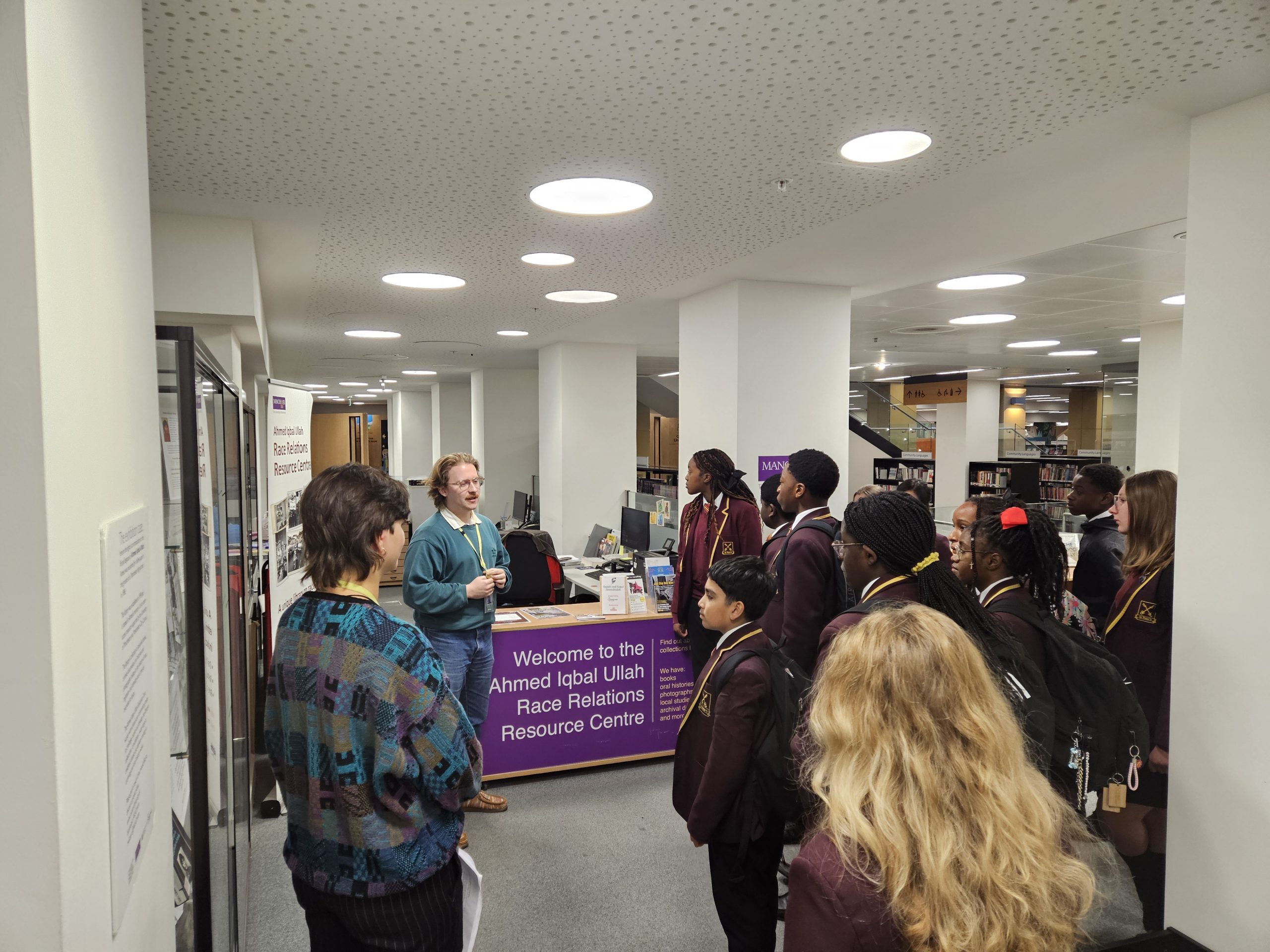 School group listens to a library staff member during a tour of the Ahmed Iqbal Ullah Race Relations Centre.